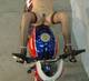 In moto a cosce aperte